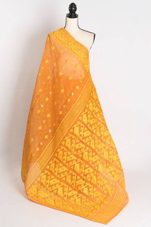 An earthy brown and yellow blended Jamdani saree in soft cotton, featuring traditional Bengali hand-loomed motifs and a sophisticated matte finish.