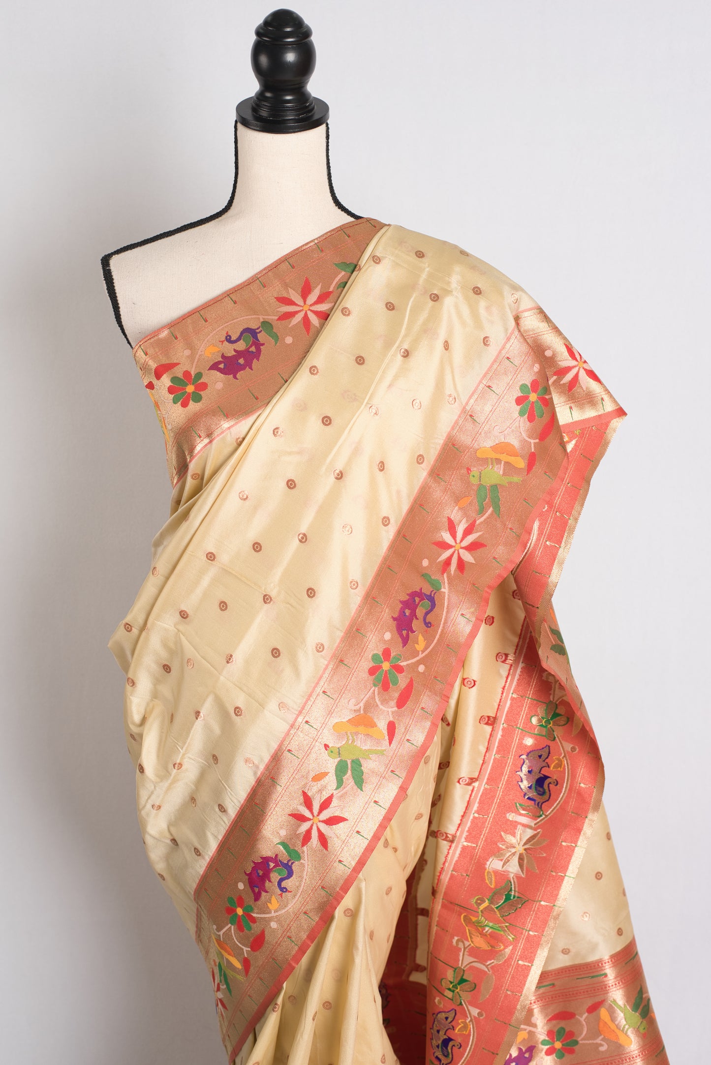 Blended Silk Paithani Saree in Cream and Gold.