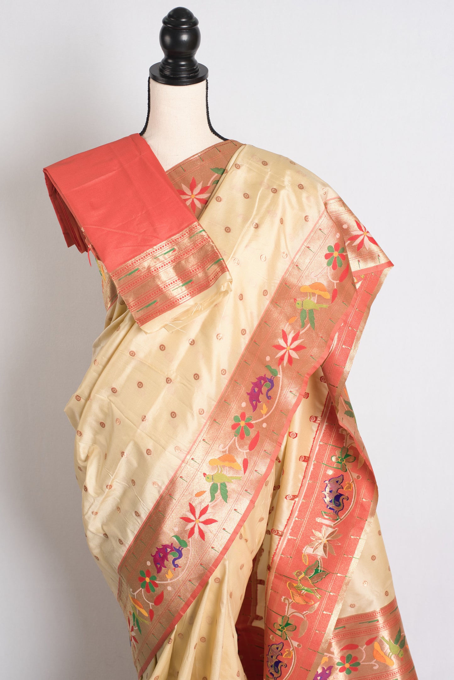 Blended Silk Paithani Saree in Cream and Gold.