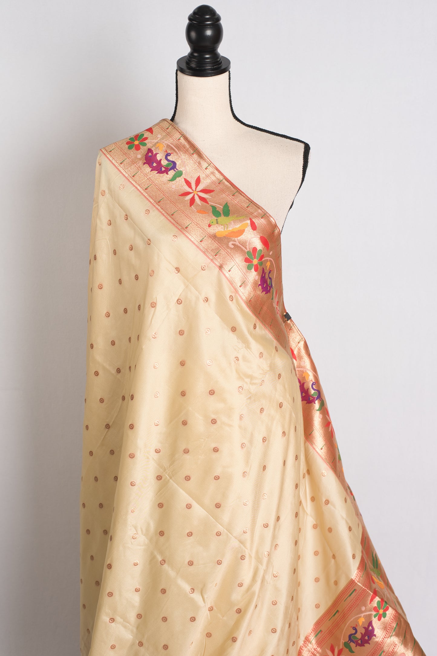 Blended Silk Paithani Saree in Cream and Gold.