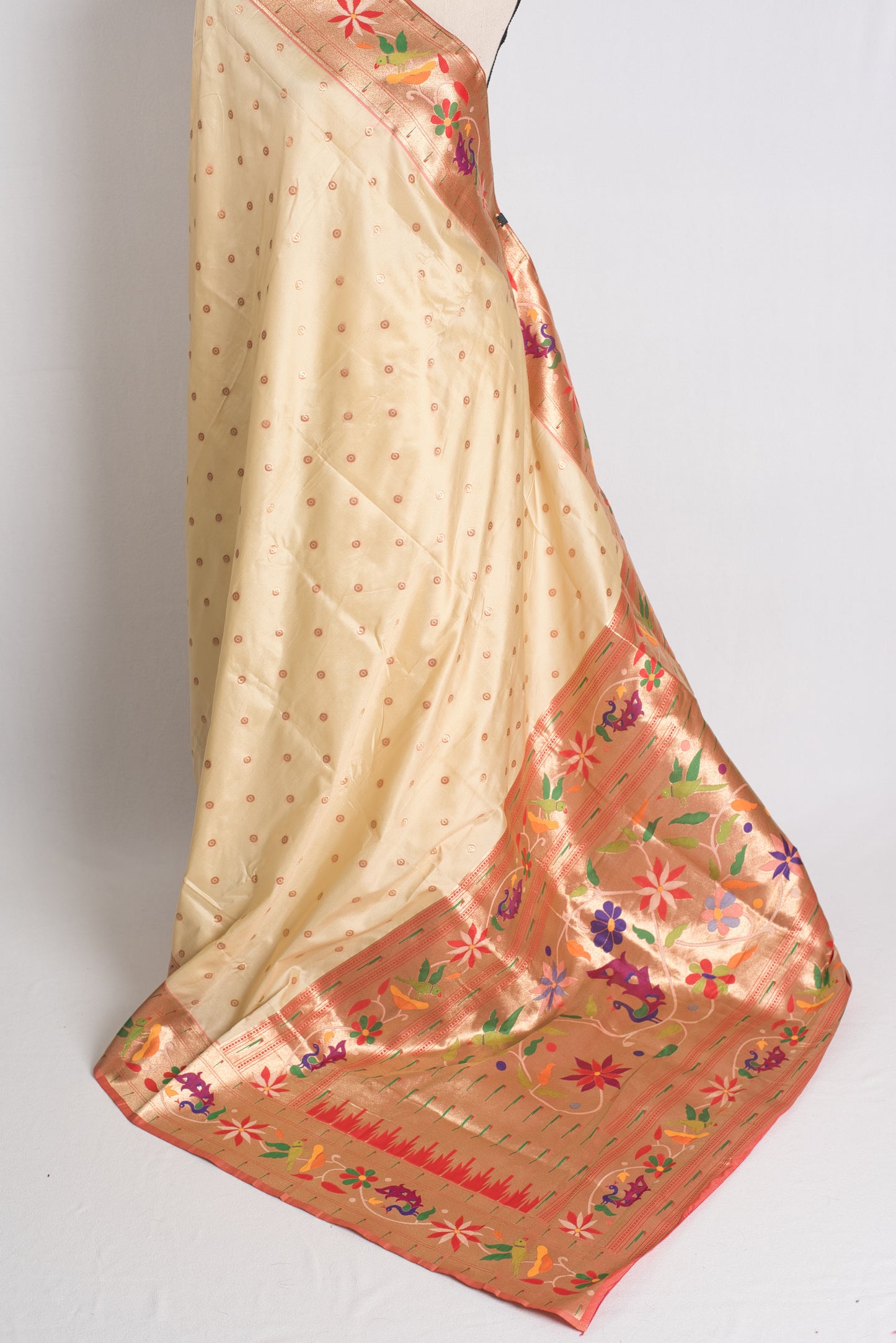 Blended Silk Paithani Saree in Cream and Gold.
