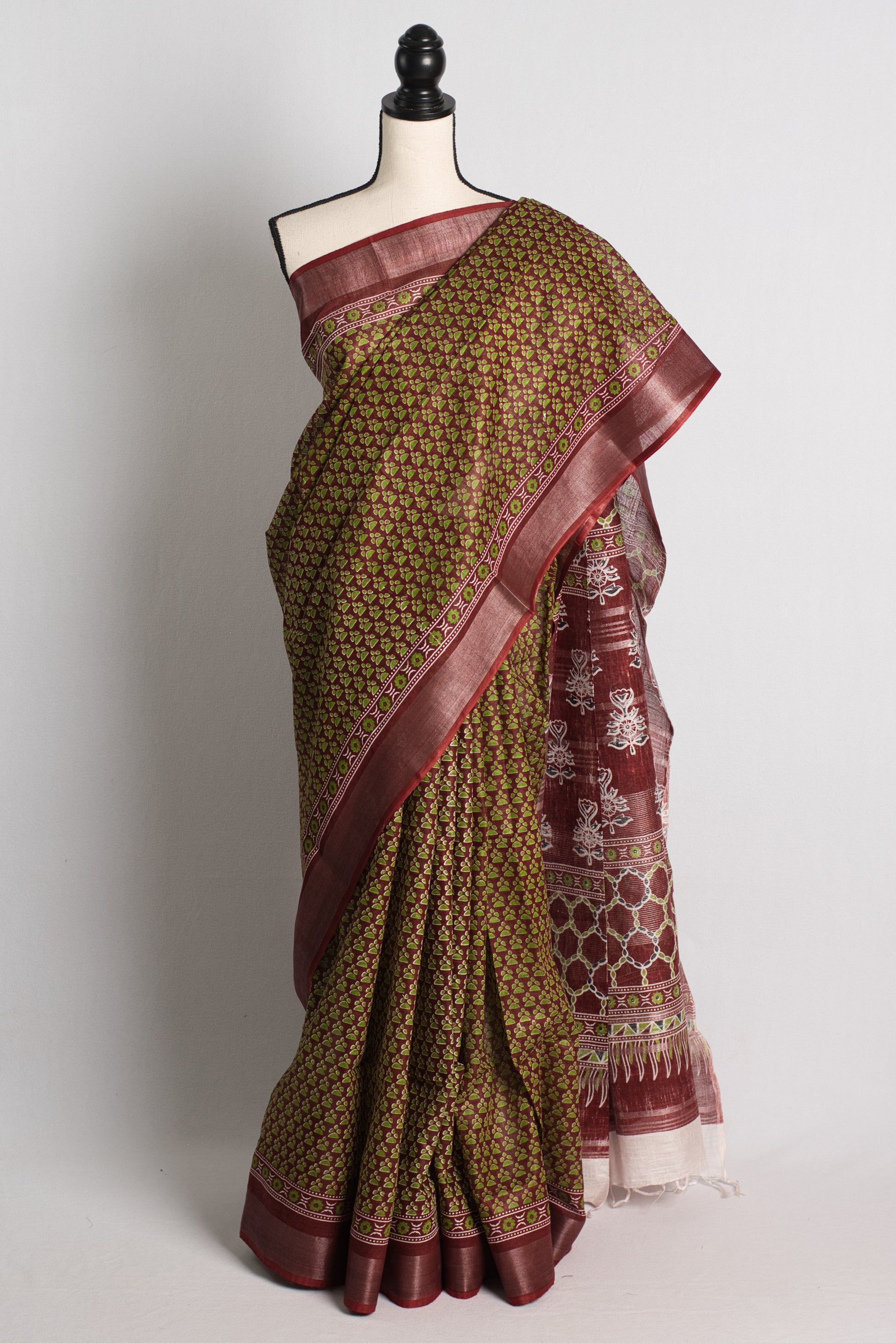 Printed Staple Cotton Saree in Green and Maroon.