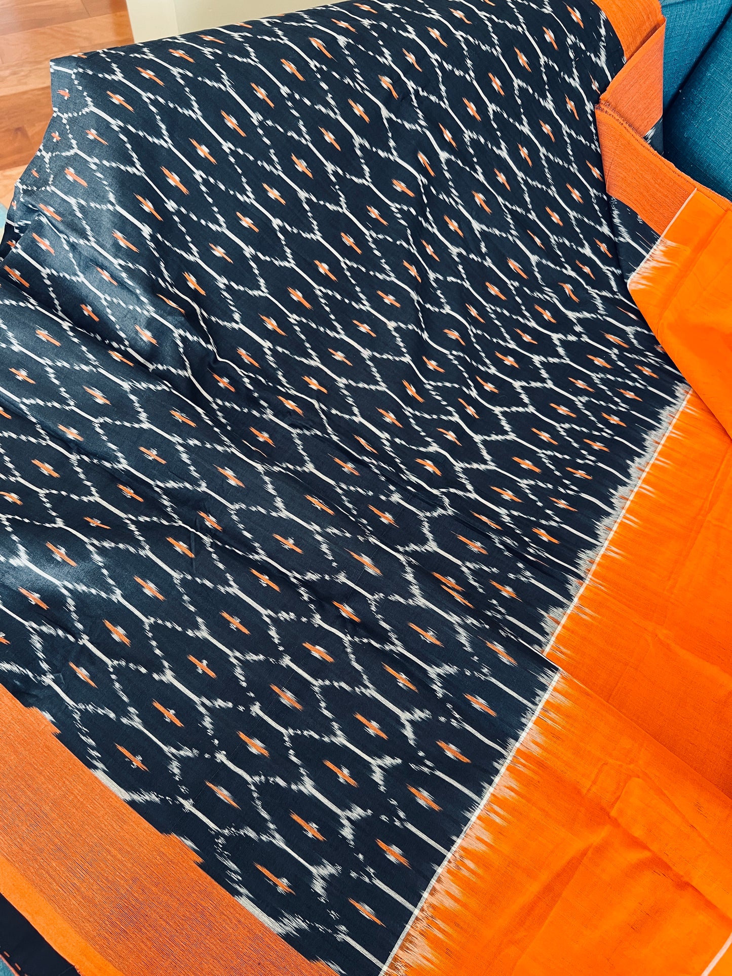 Blended Cotton Pochampally Saree in Black and Orange.