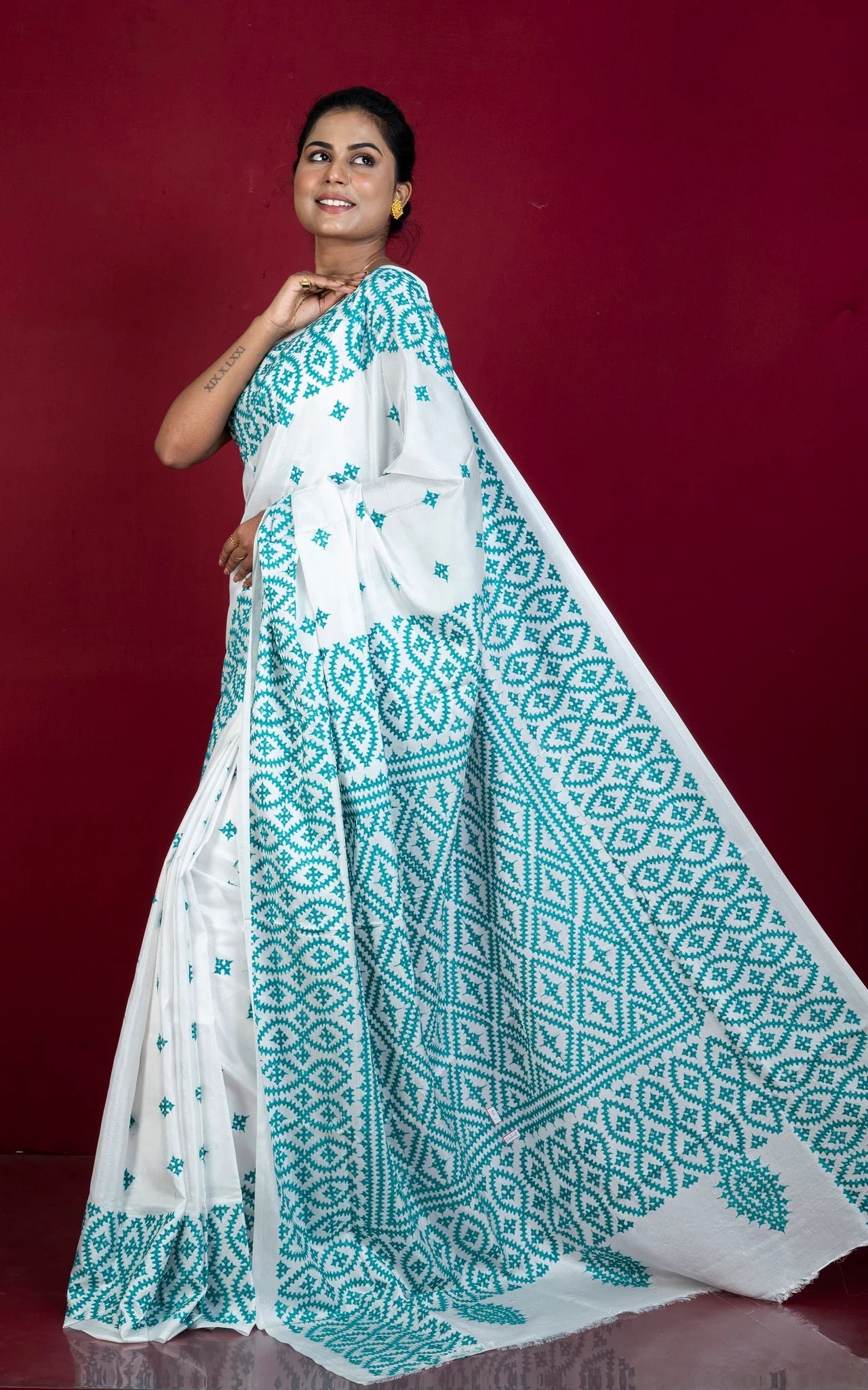 Hand Embroidery Kutch Work Blended Silk Saree in White.