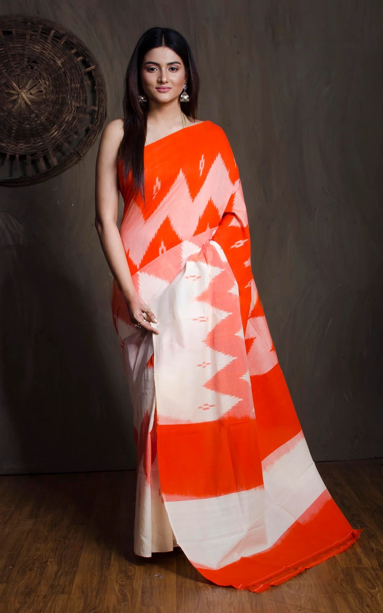 Soft Cotton Ikkat Pochampally Saree in Off White and Orange.