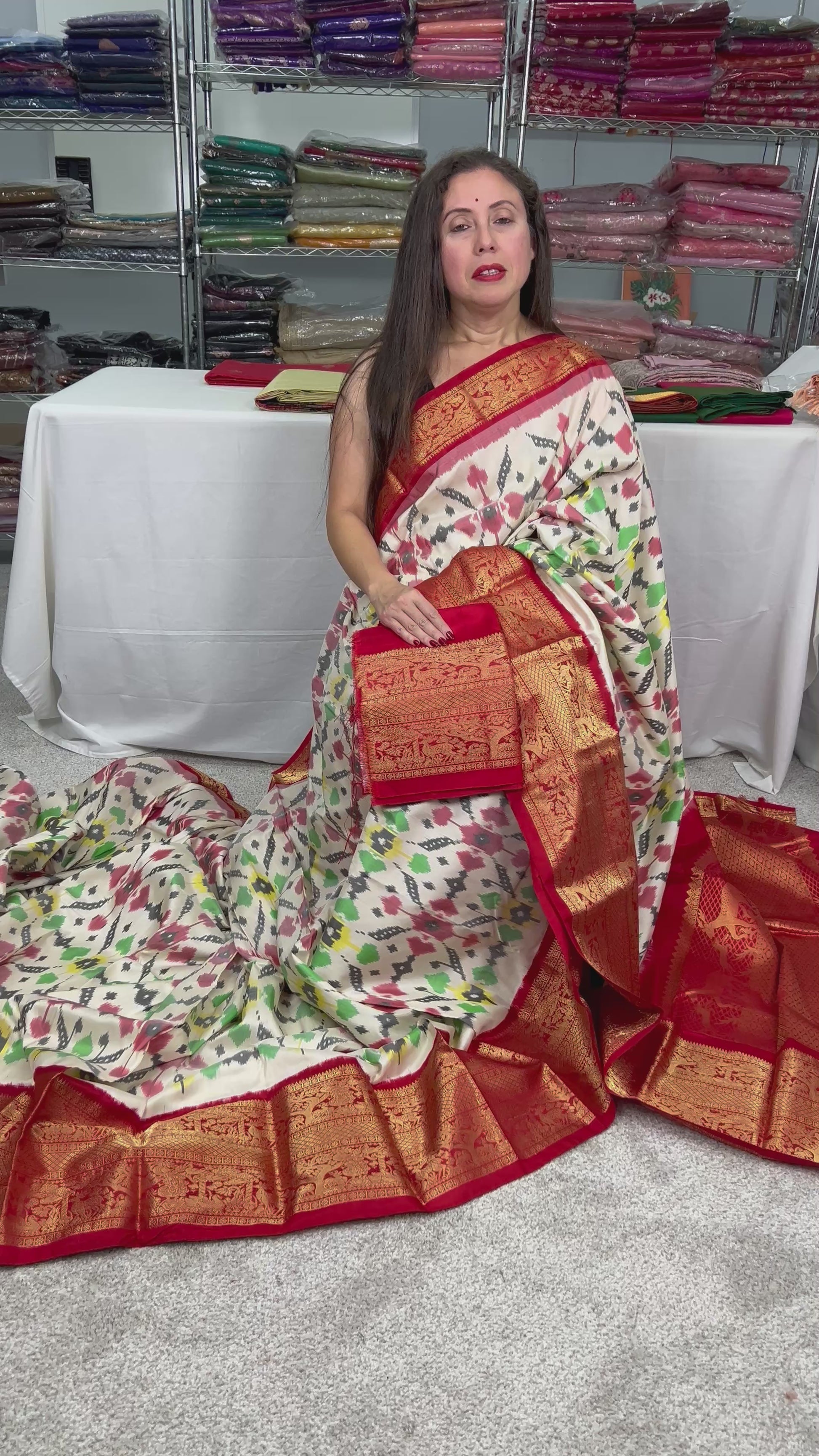 Video Of Ikkat Pochampally Saree with Kanjivaram Saree in Off White and Red