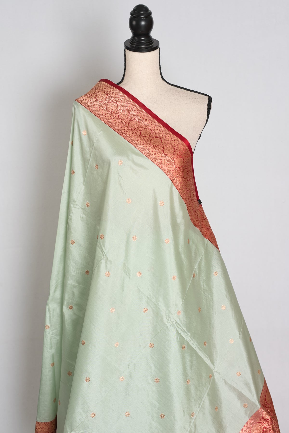 Pastel Green and Red Banarasi saree — border detail