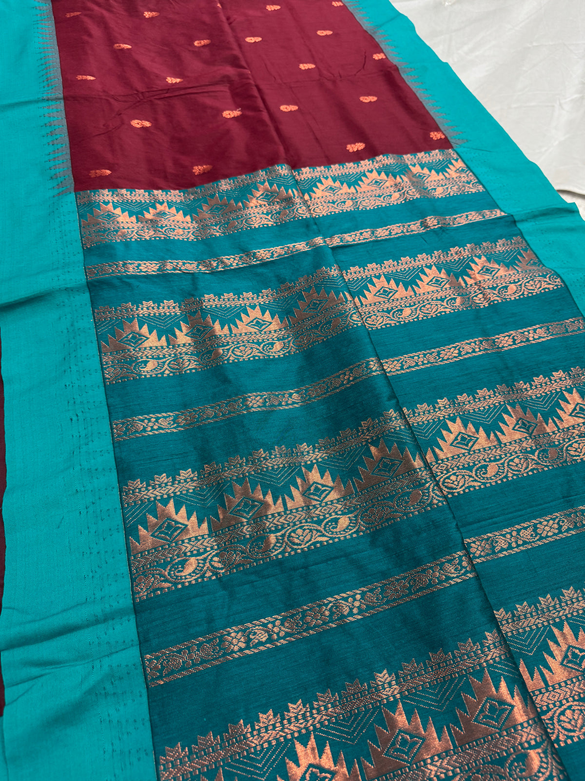 Pritha: Dark Brown and Sea Green Blended Cotton Gadwal Saree. image 1