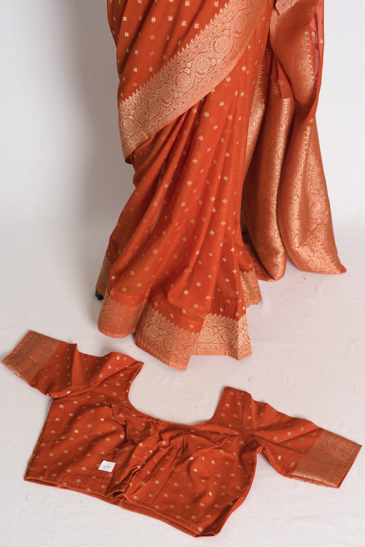 Mahi: Rust Brown Lightweight Semi Georgette Banarasi Saree with 38 Size Blouse image 1