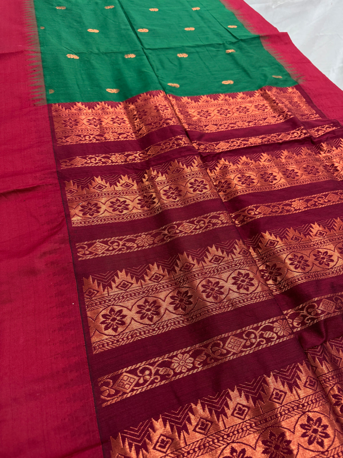 Gayetri: Dark Green Blended Cotton Gadwal Saree with Antique Zari Butis image 4