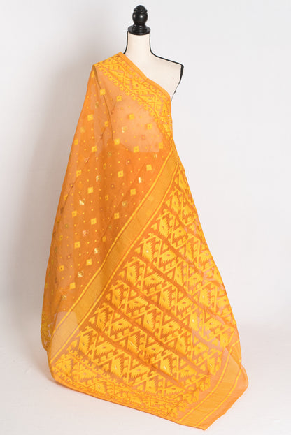 An earthy brown and yellow blended Jamdani saree in soft cotton, featuring traditional Bengali hand-loomed motifs and a sophisticated matte finish.