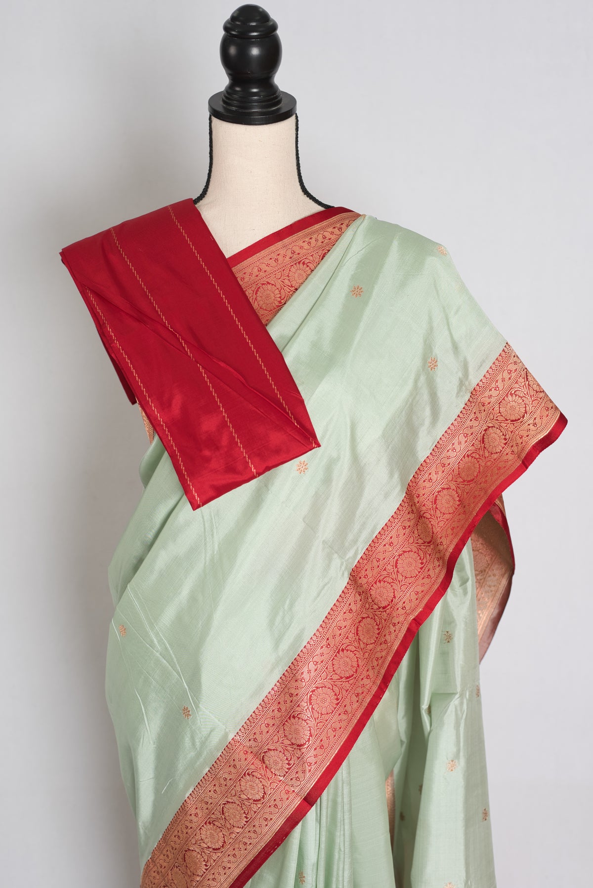 Pastel Green and Red Banarasi saree — drape view