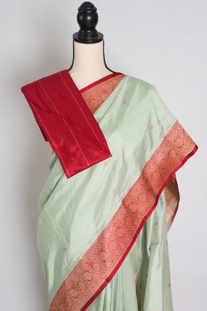 Pastel Green and Red Banarasi saree — drape view