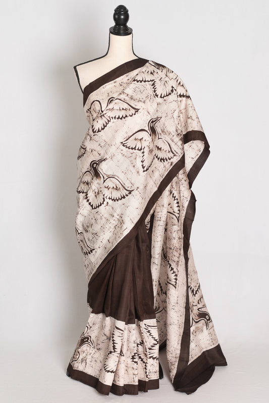 Bristi : Off-White and Coffee Brown Half and Half Hand Batik Pure Silk Saree image 0