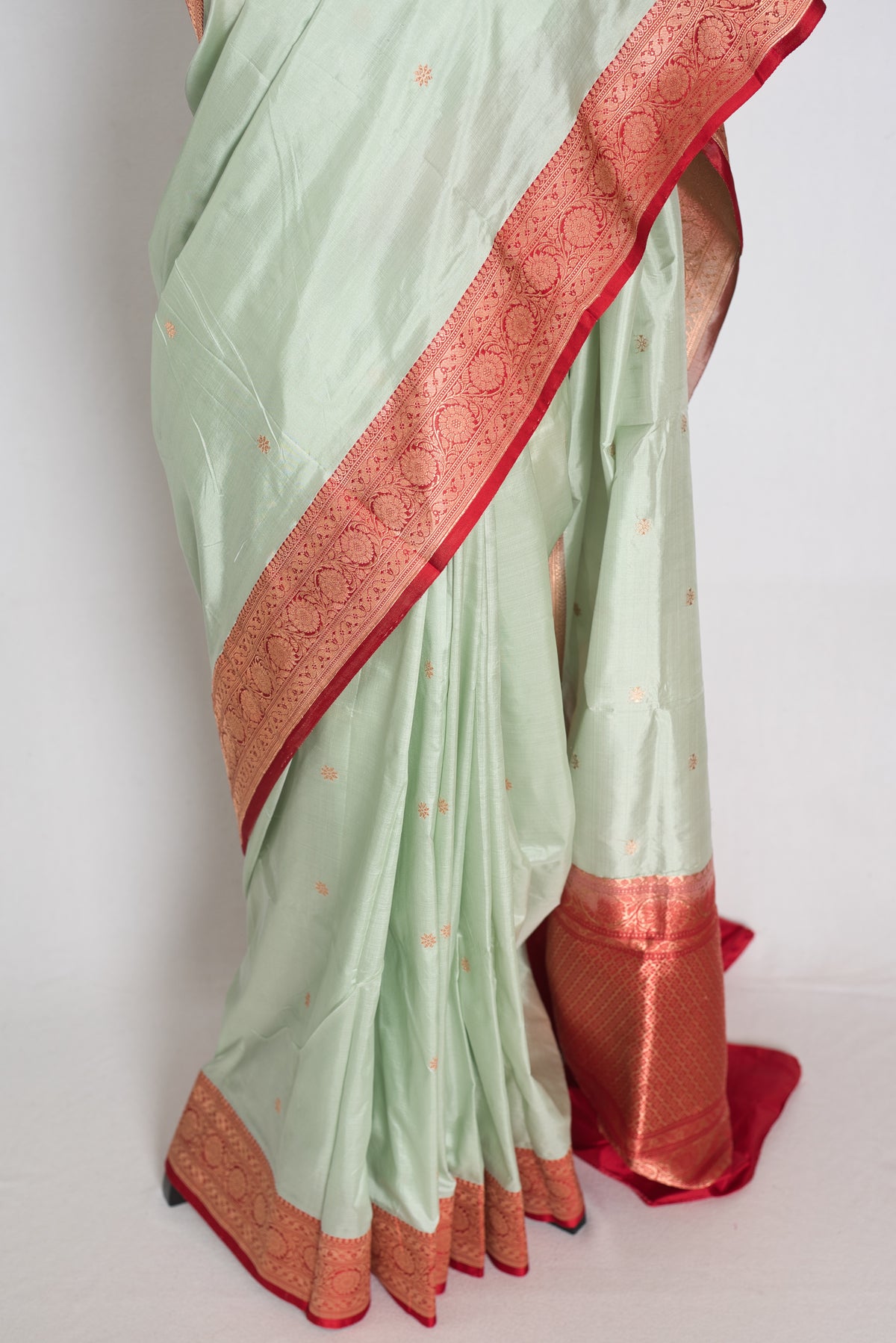 Pastel Green and Red Banarasi saree — pallu view
