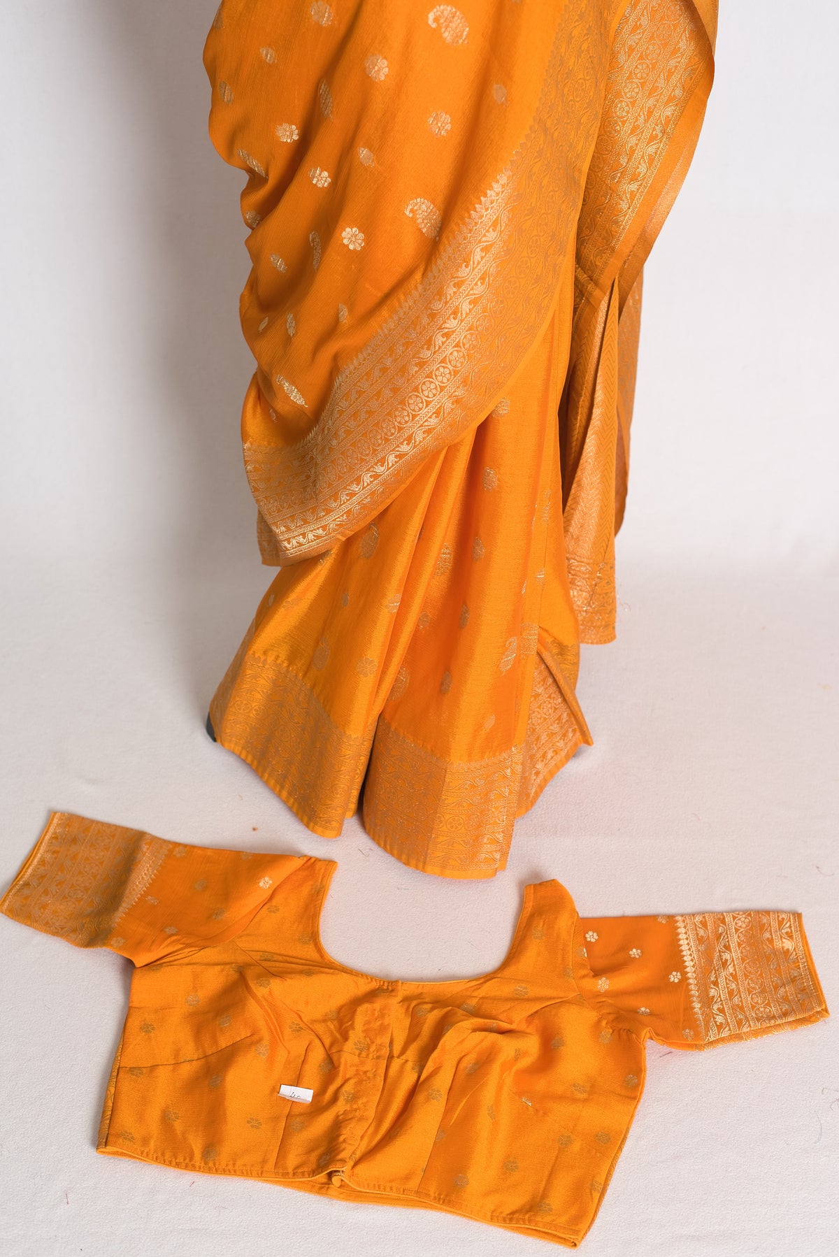 Harini: Turmeric Yellow Semi Georgette Banarasi Saree with 40 Size Blouse image 1
