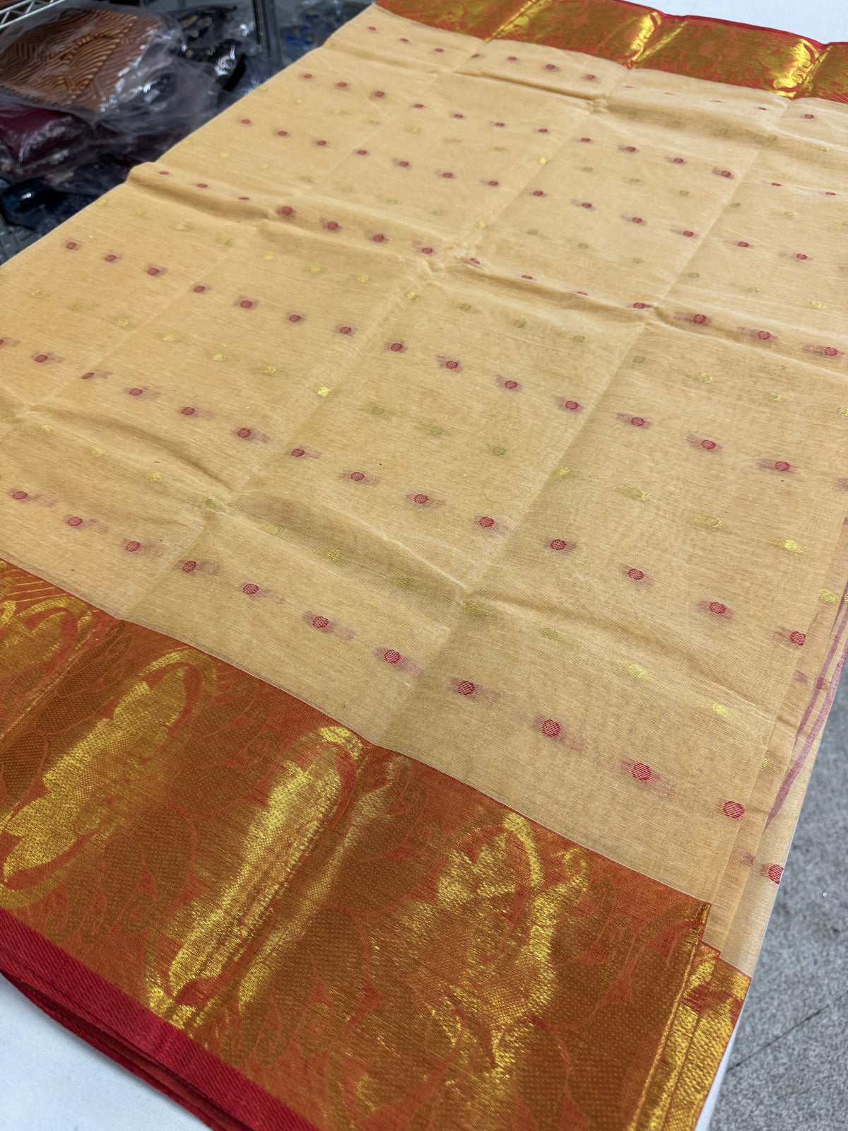 Beige and Red Tant saree — detail view