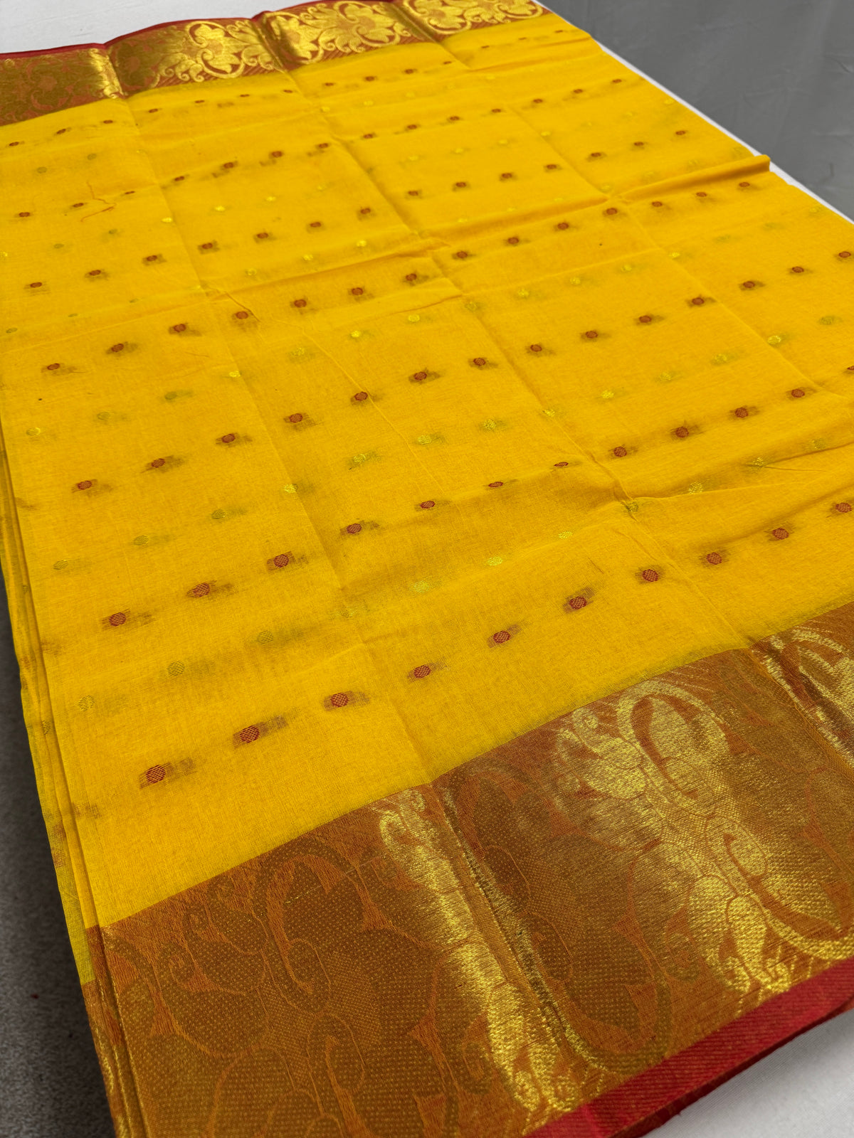 Yellow and Red Tant saree — detail view