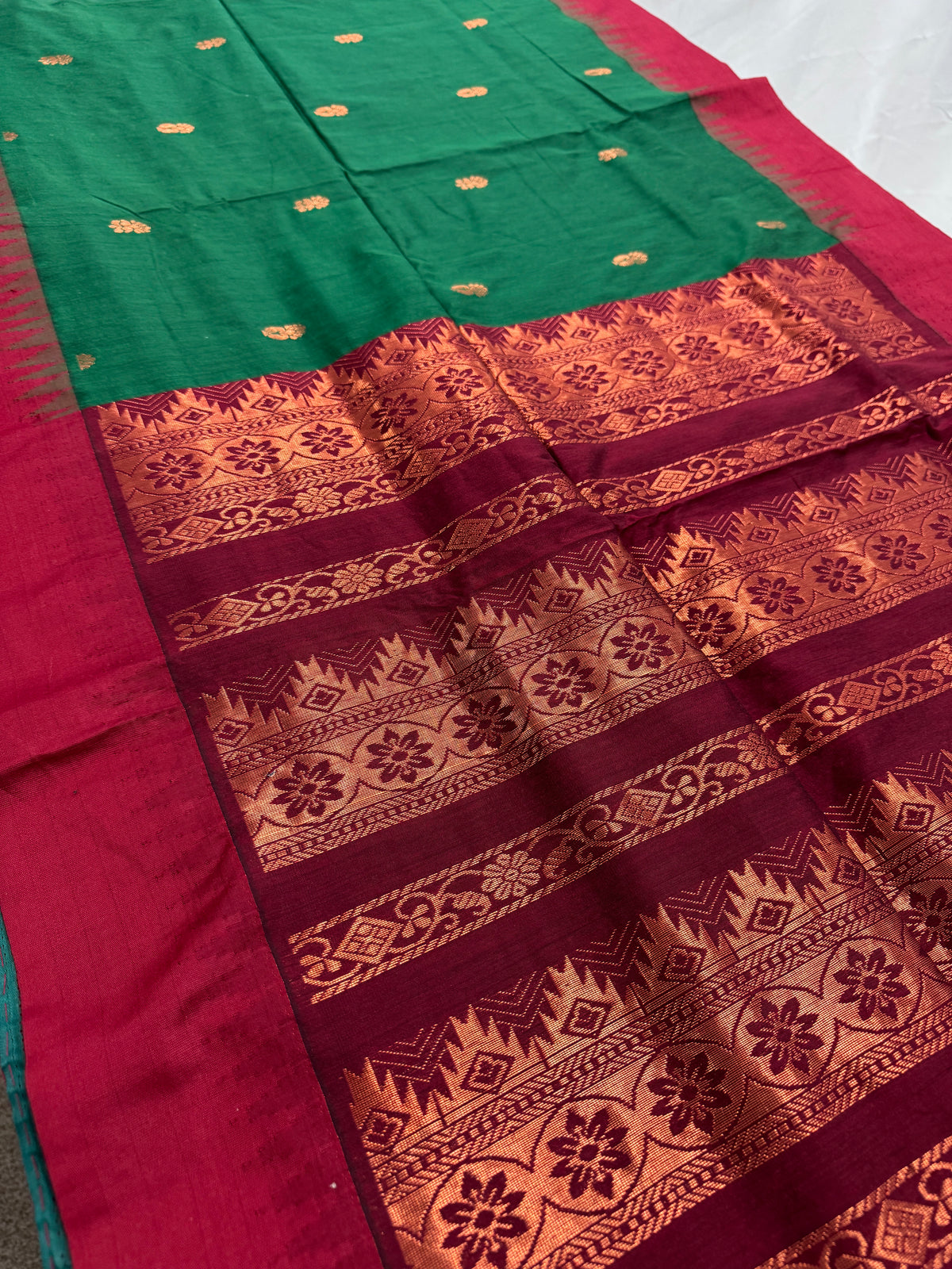 Gayetri: Dark Green Blended Cotton Gadwal Saree with Antique Zari Butis image 0