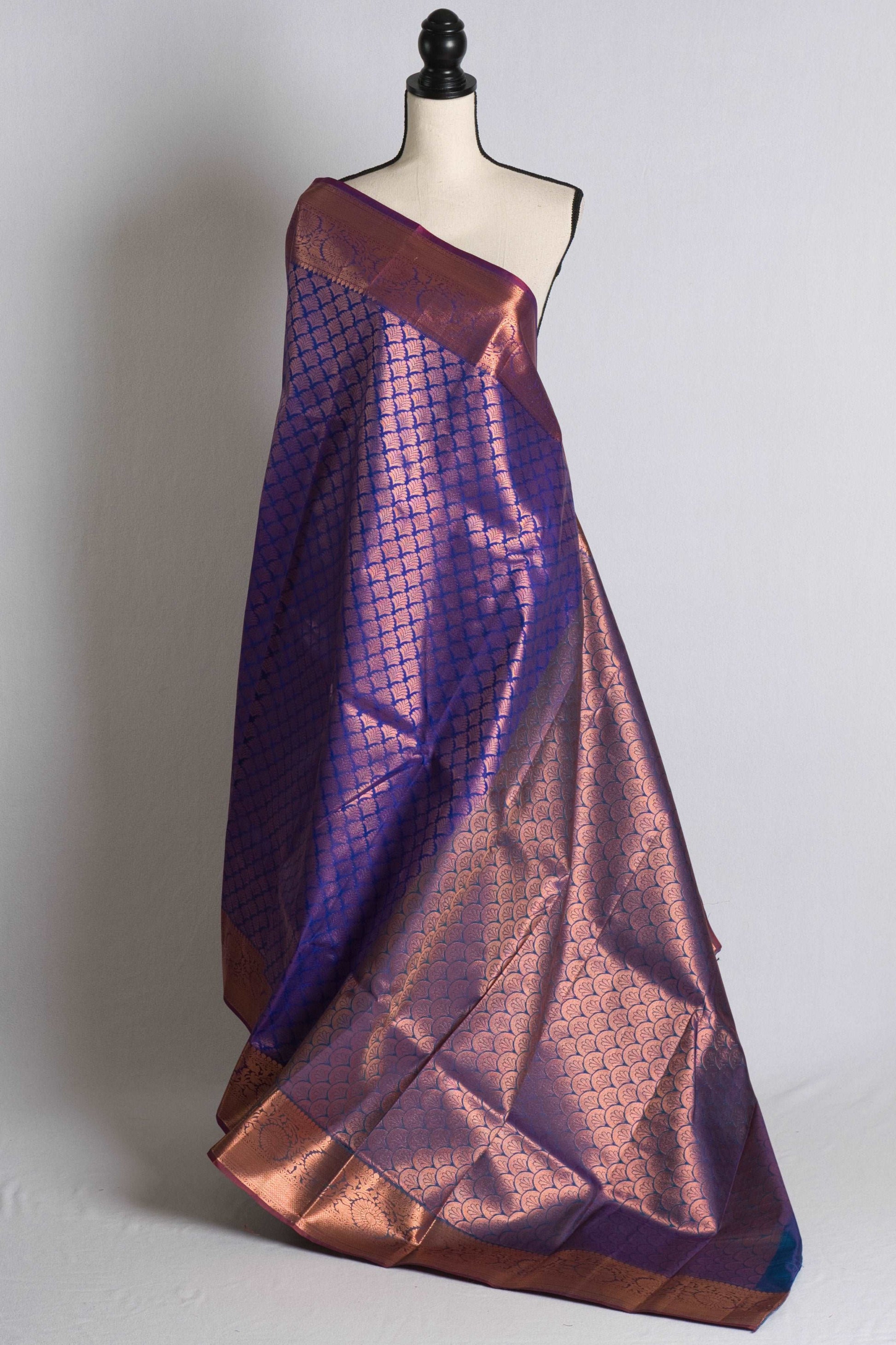 Blended Silk Starched Kanchipuram Saree in Blue and Gold.