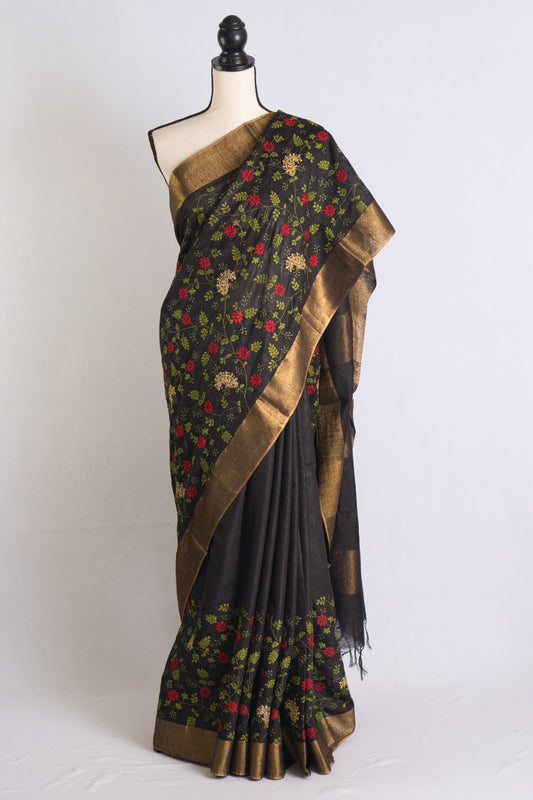 Semi Tussar Embroidery Saree in Black with Gold Border.