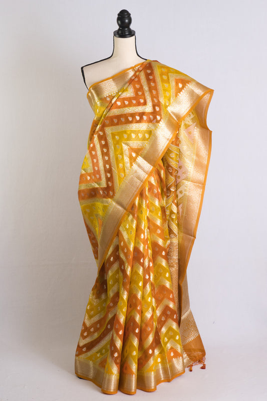 Silk Mark Certified Kora Rangkat Banarasi Saree in Yellow, Orange and Silver.