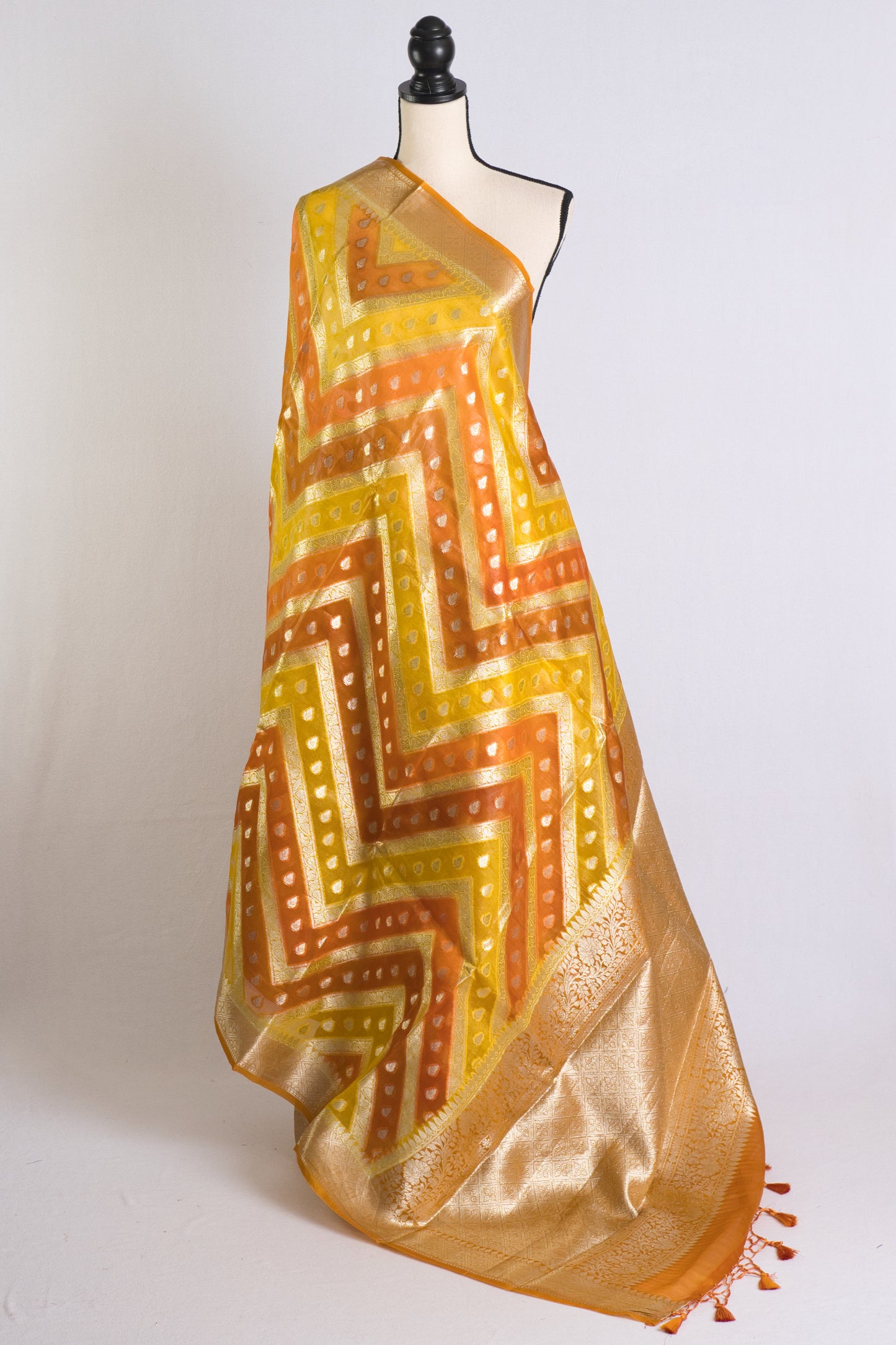 Silk Mark Certified Kora Rangkat Banarasi Saree in Yellow, Orange and Silver.