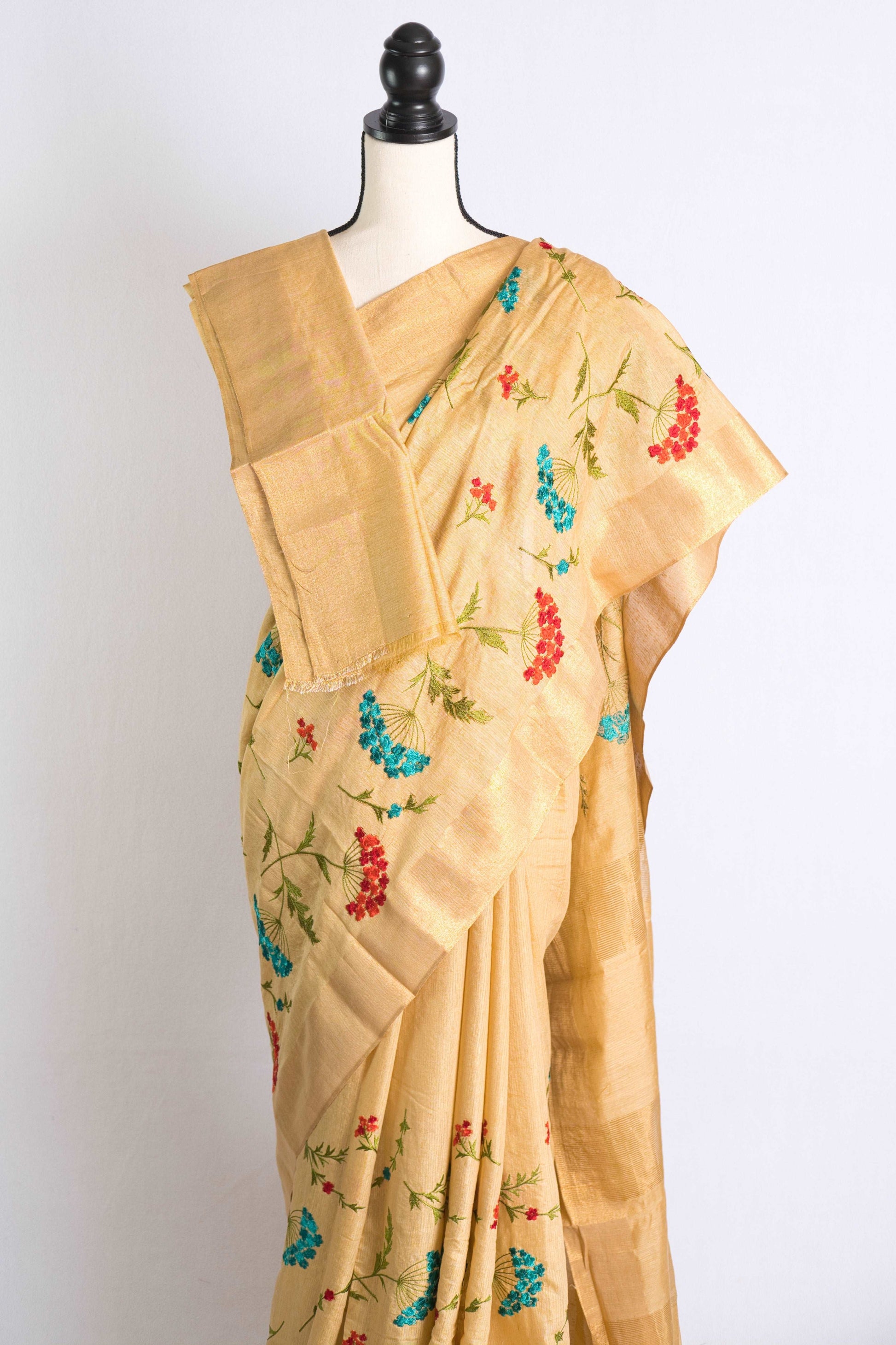 Semi Tussar Embroidery Saree in Beige with Gold Border.