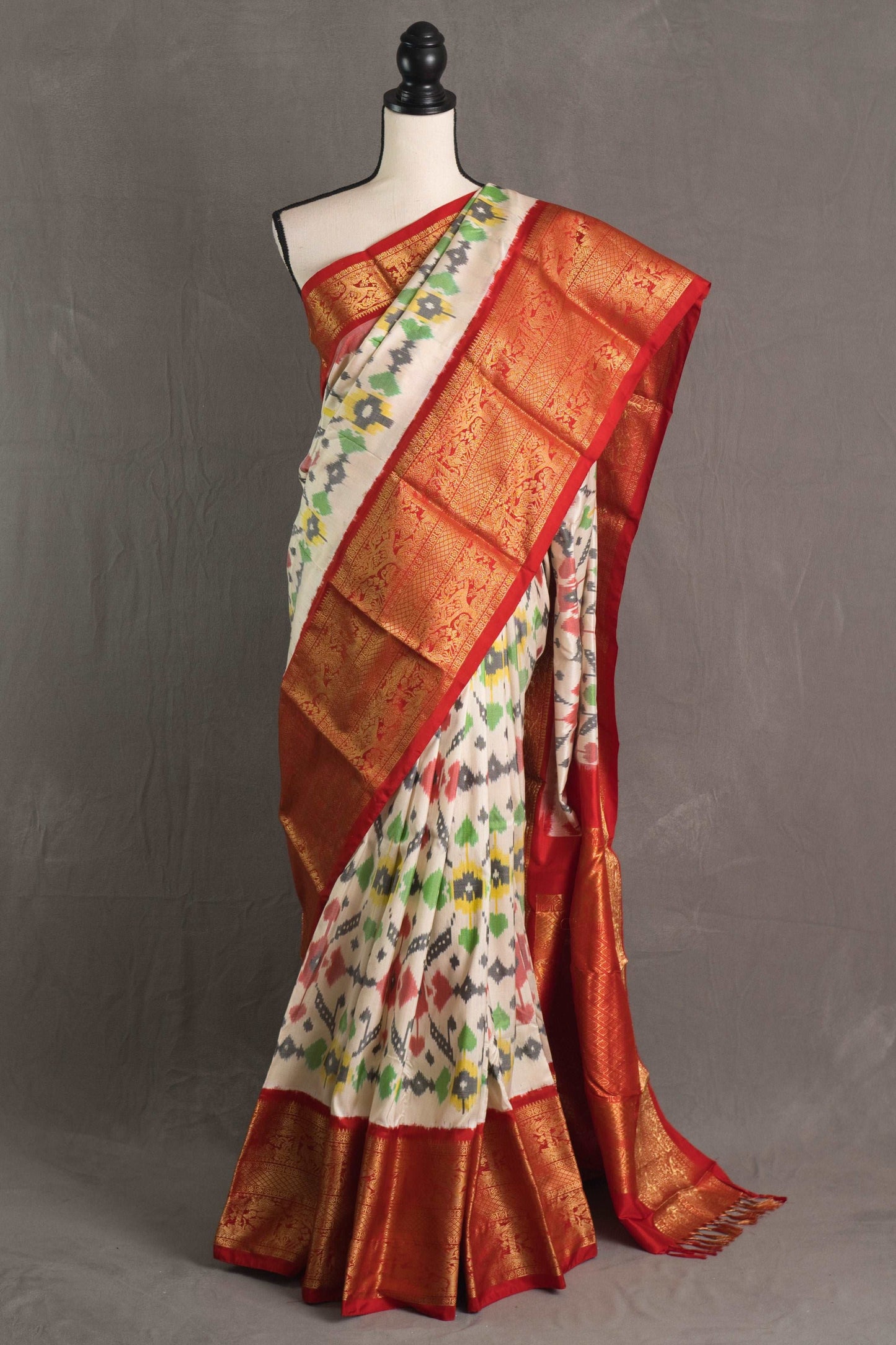 Ikkat Pochampally Saree with Kanjivaram Saree in Off White and Red.