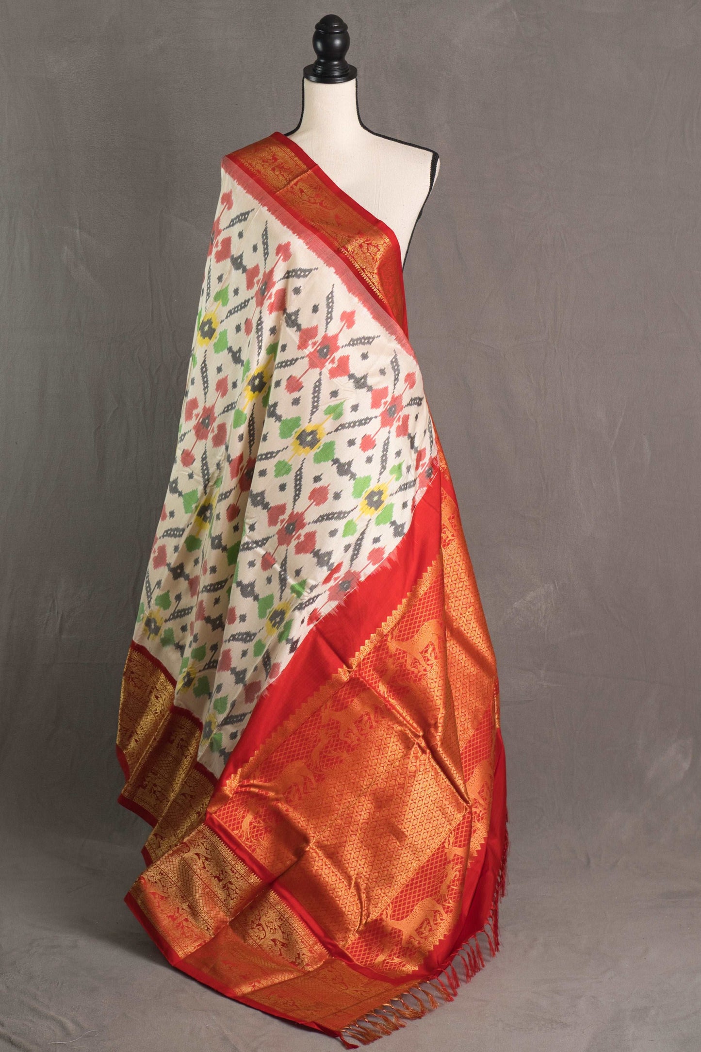 Ikkat Pochampally Saree with Kanjivaram Saree in Off White and Red.