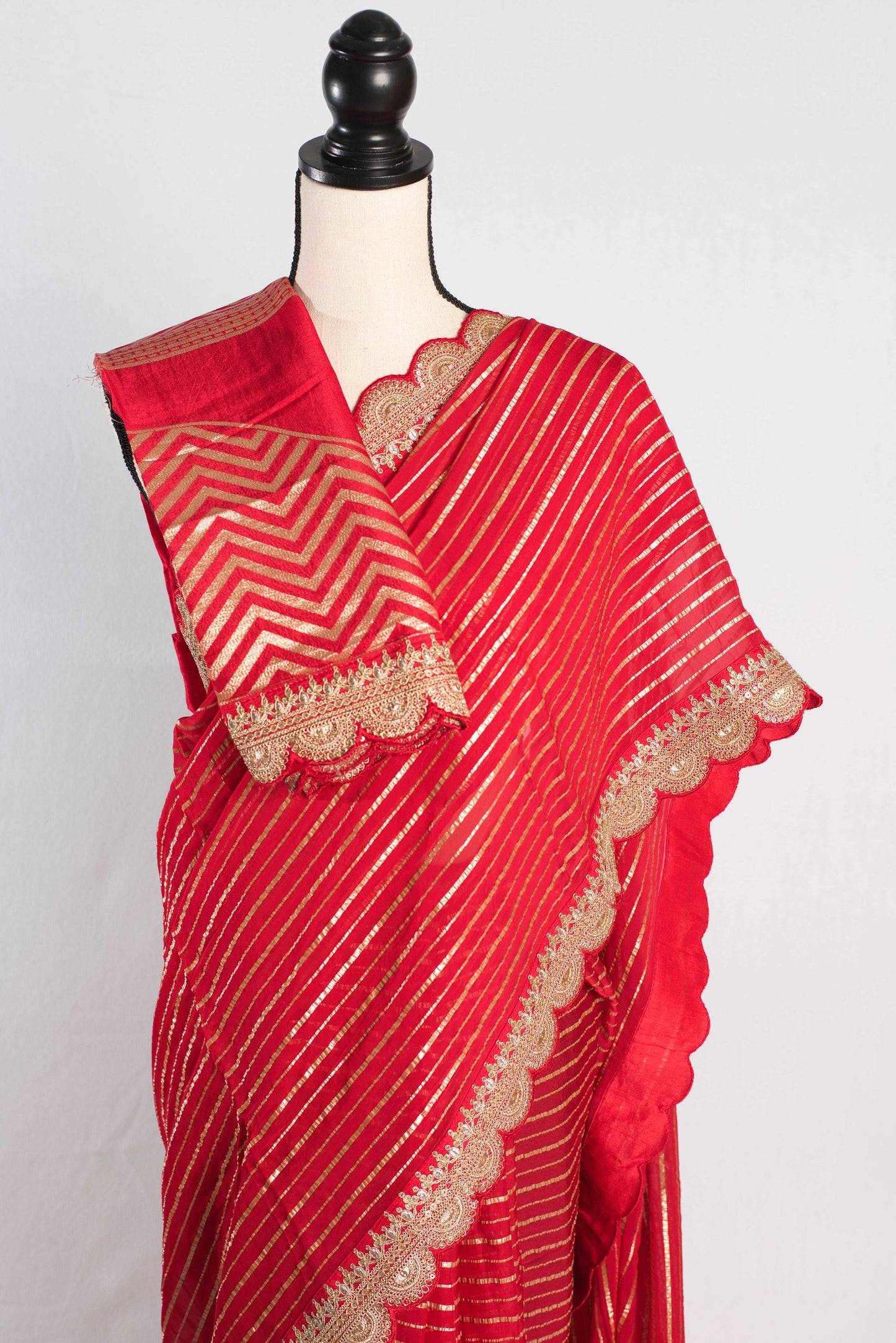 Red Georgette Saree with Golden Stripes and Designer Border