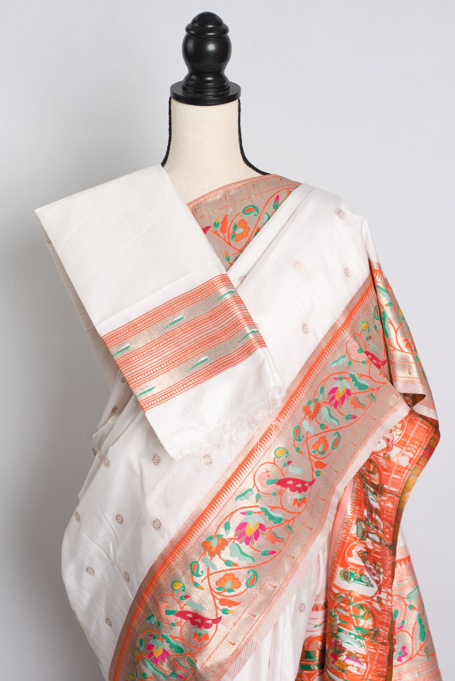 Blended Silk Paithani Saree in White and Orange.