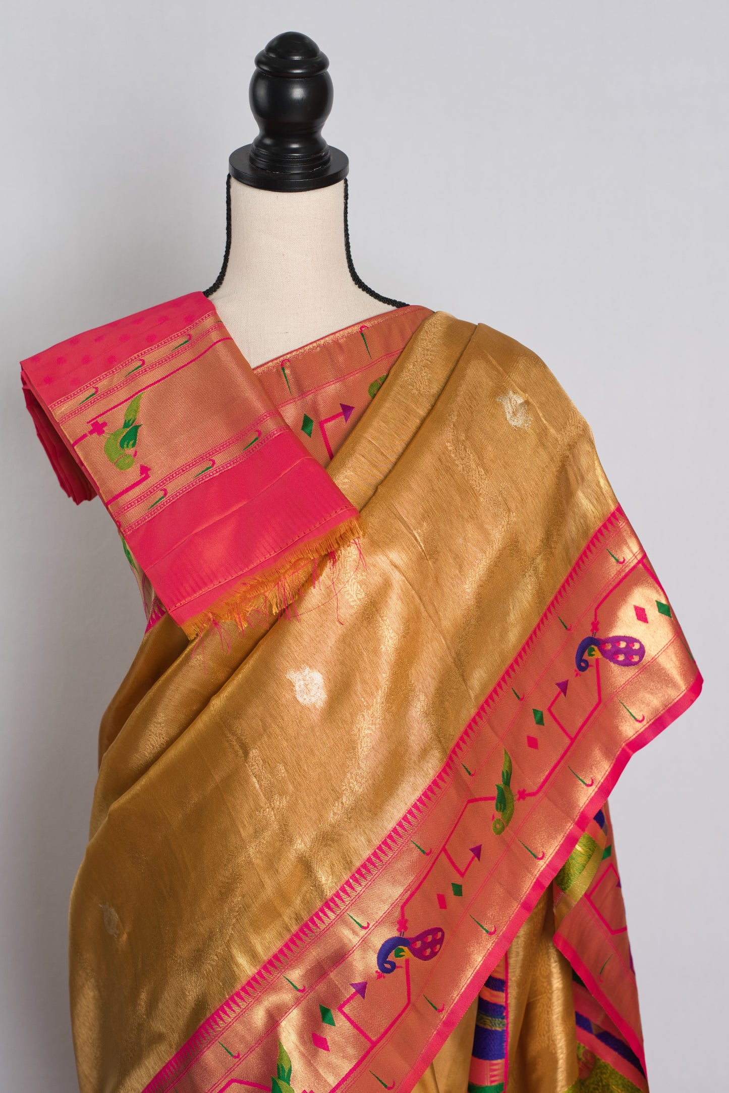 Blended Tissue Silk Golden Paithani Saree with Pink Border.