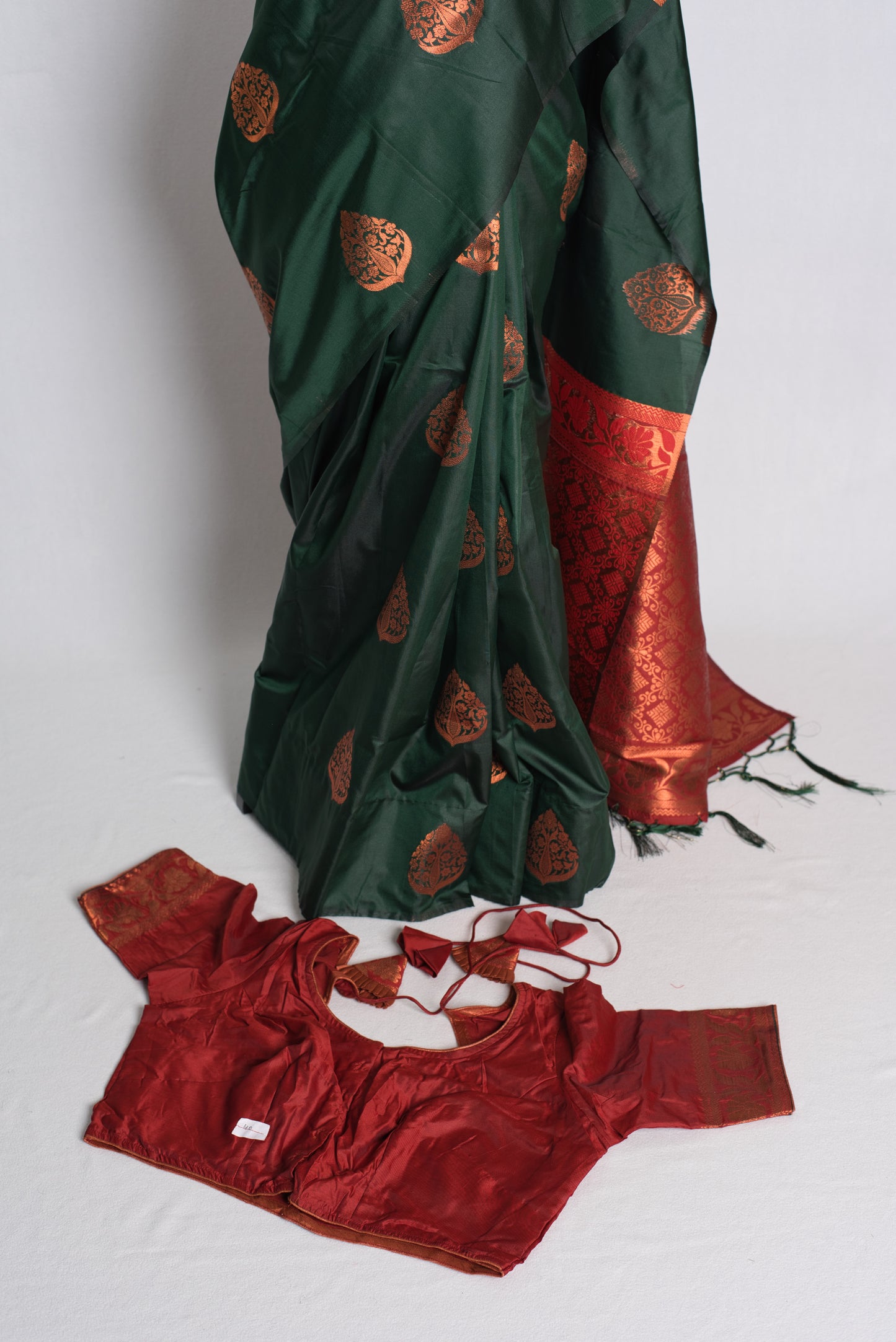 Blended Silk Kanchipuram Saree with 40 Size Blouse in Dark Green.