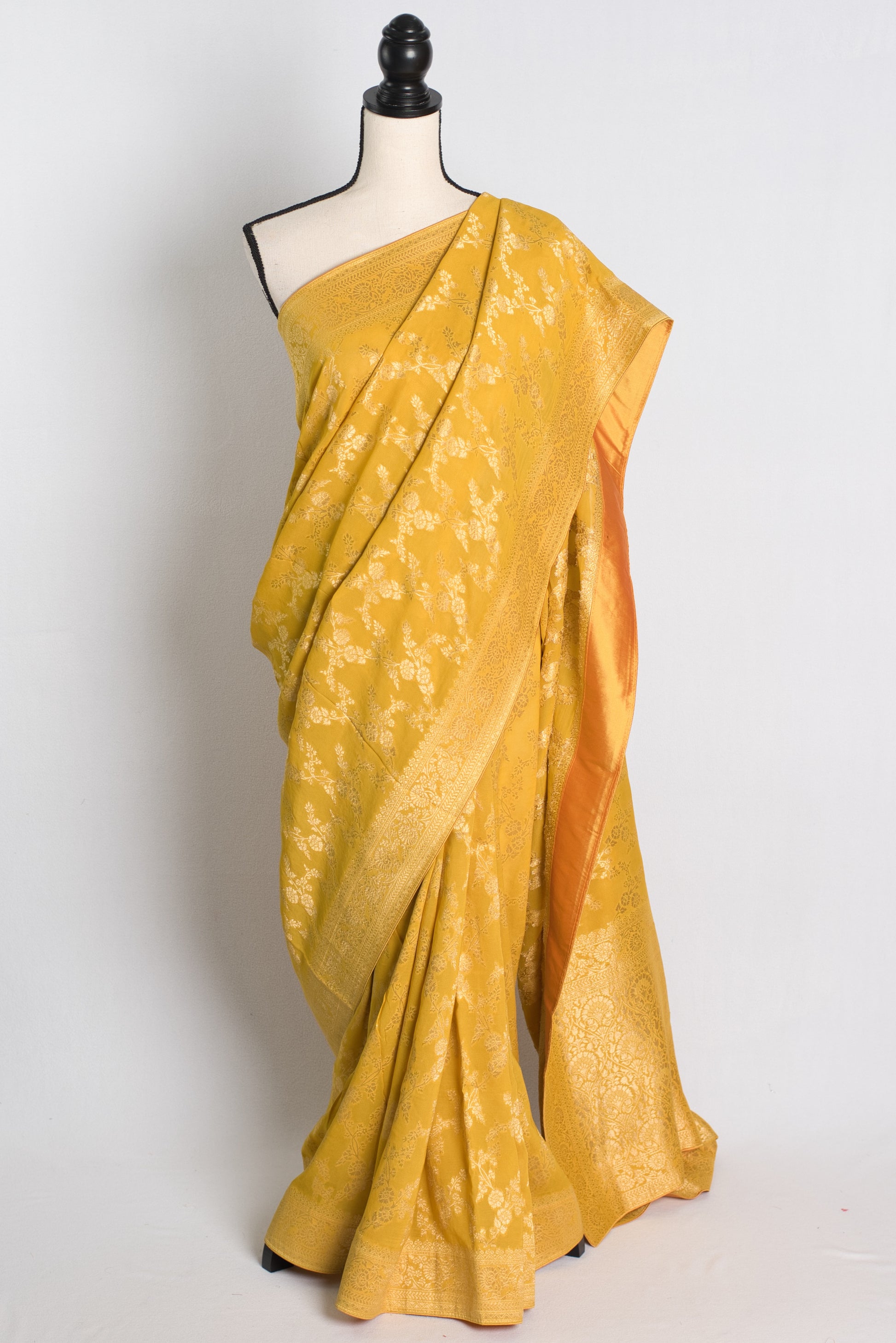 Jaal Work Crepe Georgette Banarasi Saree in Yellow and Gold.