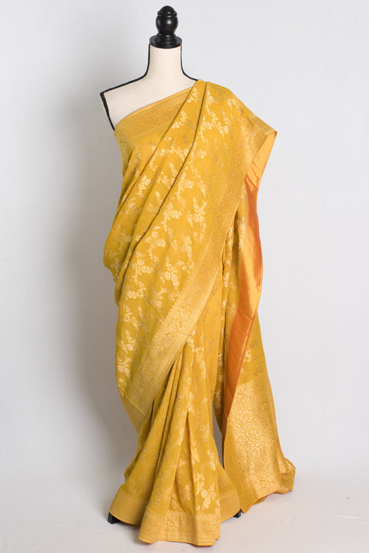 Jaal Work Crepe Georgette Banarasi Saree in Yellow and Gold.