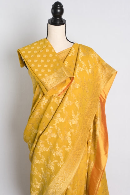 Jaal Work Crepe Georgette Banarasi Saree in Yellow and Gold.