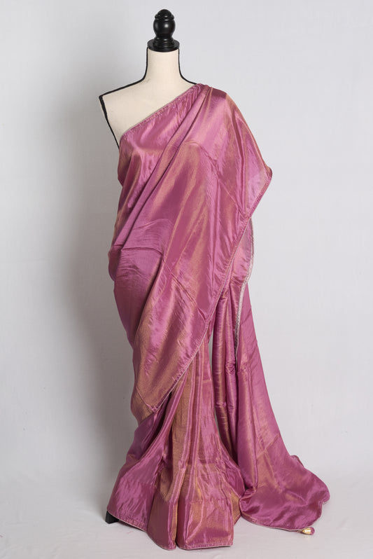 Soft Designer Tissue Saree in Purple with a Shimmer of Gold.