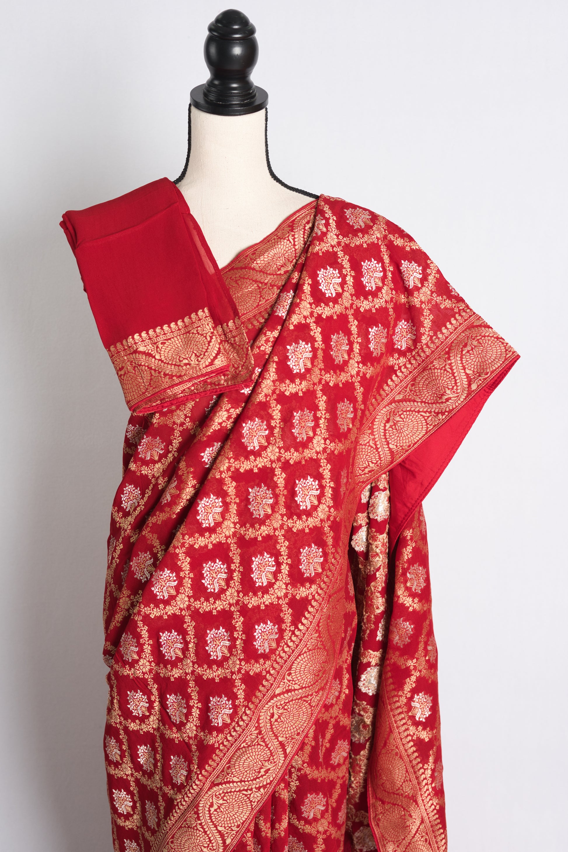 Jaal Work Crepe Georgette Banarasi Saree in Red and Gold.