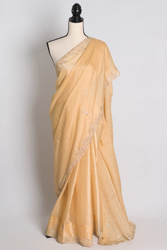 Stone Embroidery Partywear Soft Crush Tissue Saree in Beige.