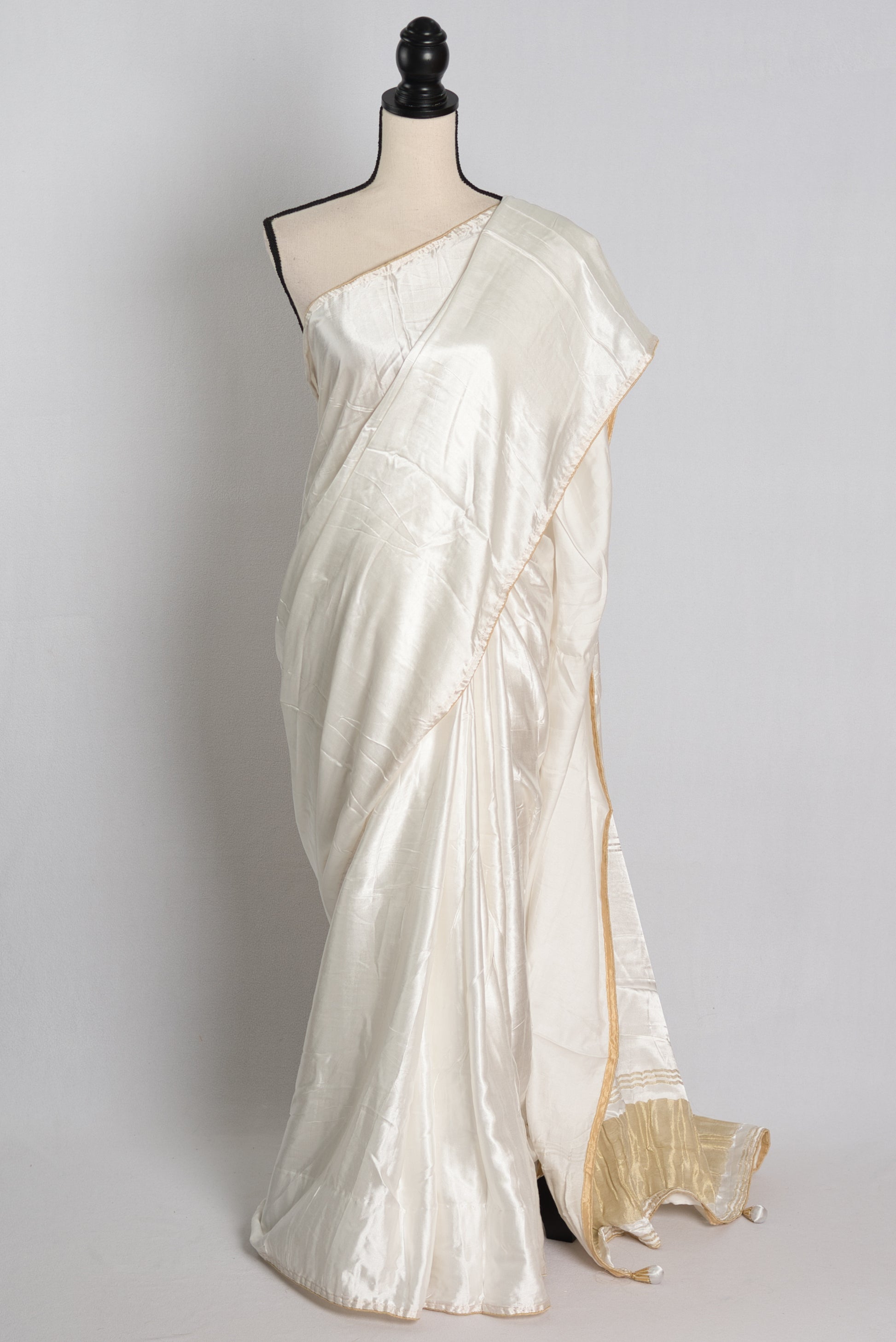 White Designer Modal Silk Saree with Gold Pallu.