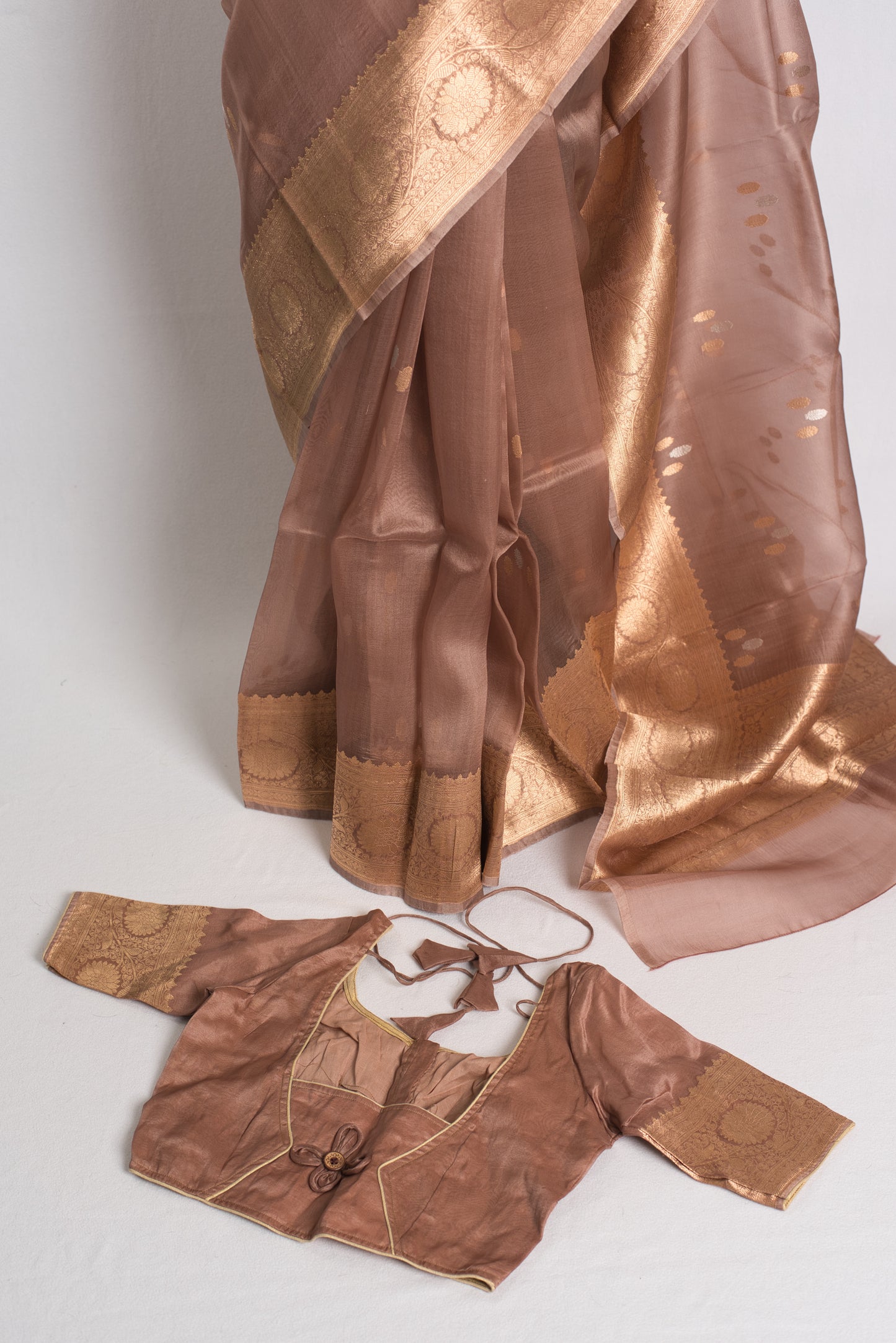 Kora Silk Banarasi Saree with 36 Size Stitched Blouse in Brown and Gold.