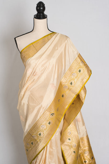 Kamalini : Silk Mark Certified Cream Banarasi Saree with Meenakari Work