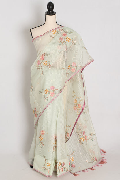 Sea green blended cotton kota saree with floral embroidery, self checks pattern, and pink piping border.