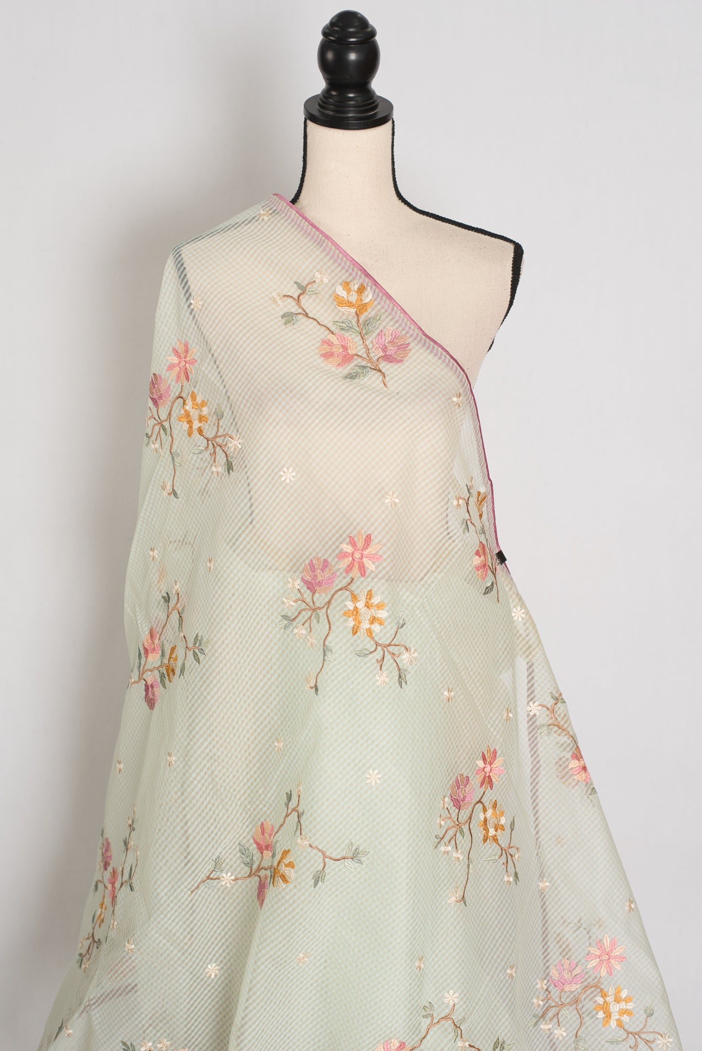 Sea green blended cotton kota saree with floral embroidery, self checks pattern, and pink piping border.