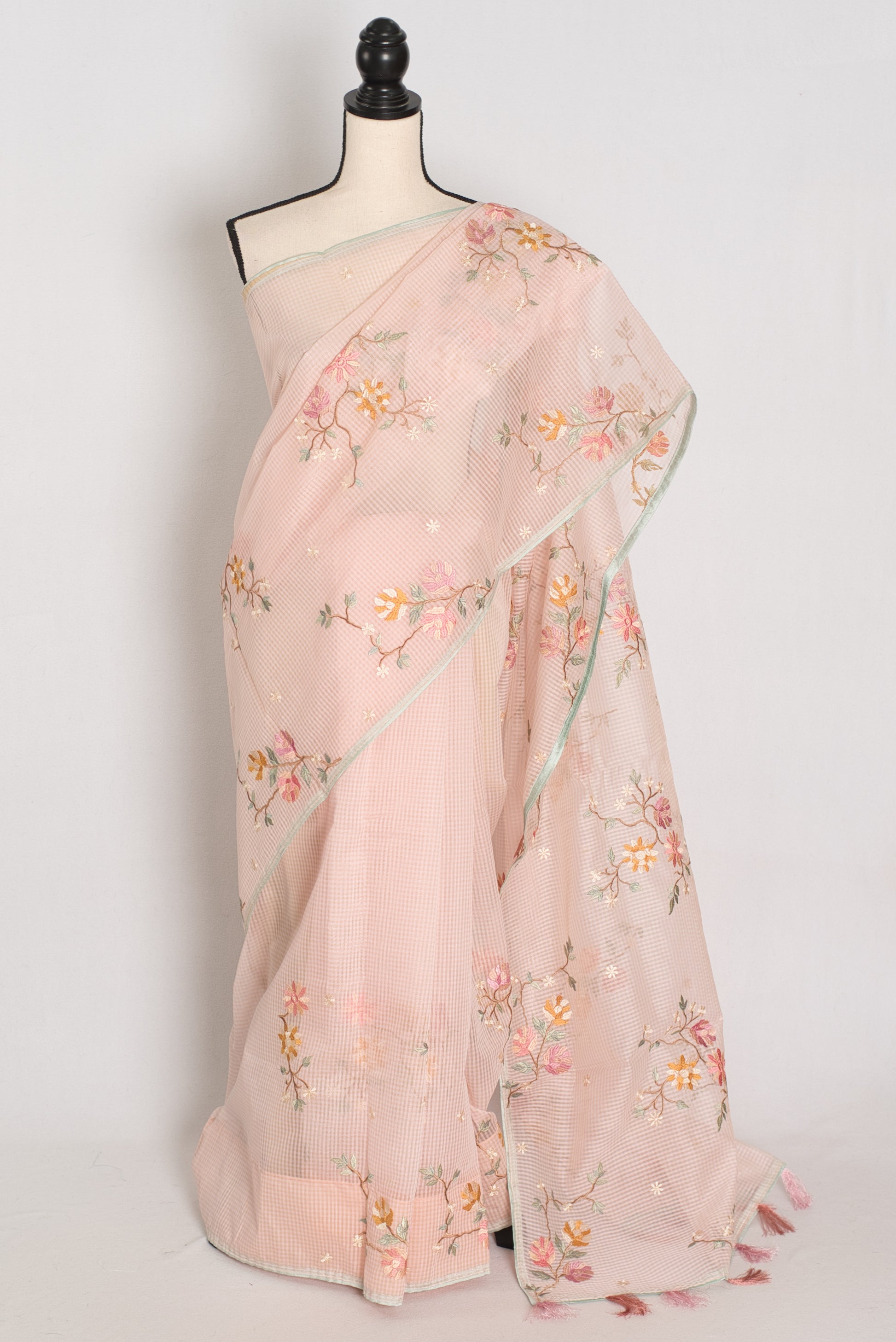 Rohini collection: Pink blended cotton kota saree with floral embroidery, self checks, and sky blue piping border.