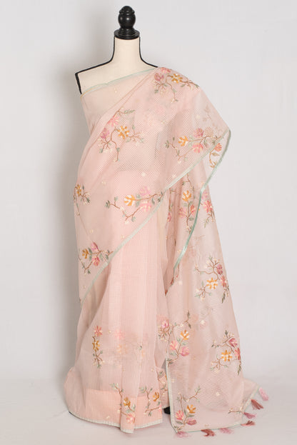 Rohini collection: Pink blended cotton kota saree with floral embroidery, self checks, and sky blue piping border.