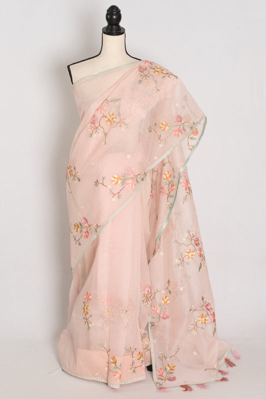 Rohini collection: Pink blended cotton kota saree with floral embroidery, self checks, and sky blue piping border.