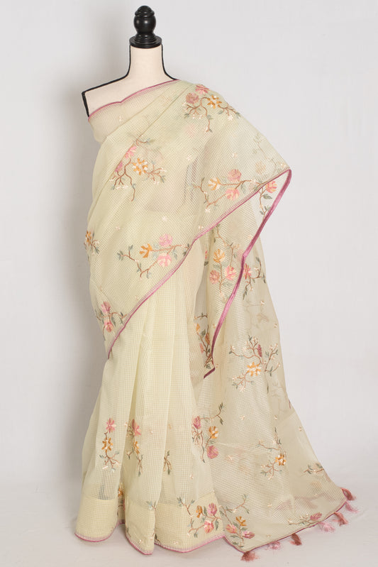 Ragini collection: Sea green blended cotton kota saree with pink floral machine embroidery and pink piping border.