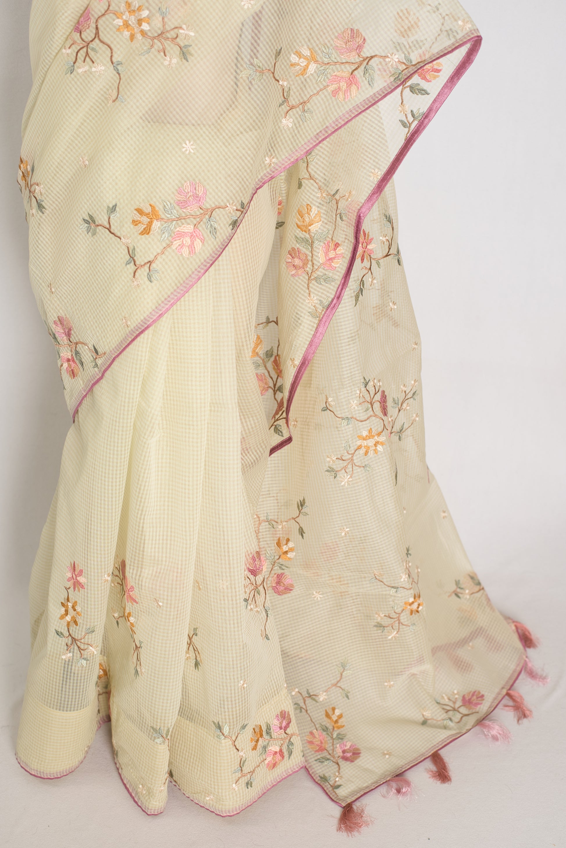 Ragini collection: Sea green blended cotton kota saree with pink floral machine embroidery and pink piping border.
